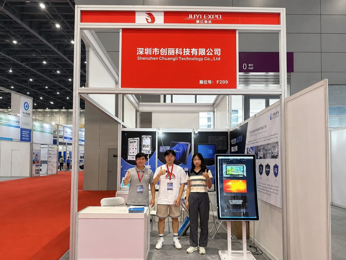 CRTLY team exhibiting a self-service kiosk at an industry trade show